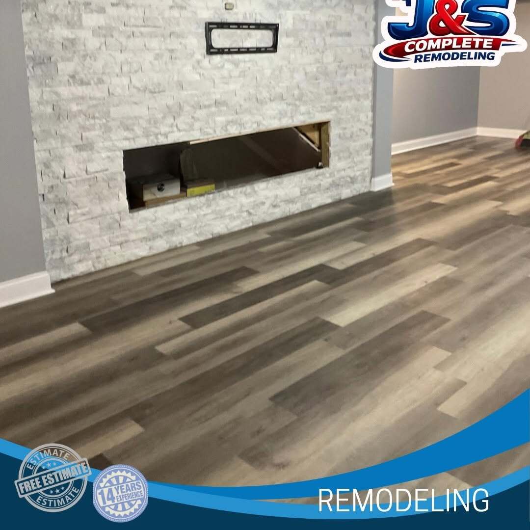 Stone fireplace with vinyl plank flooring